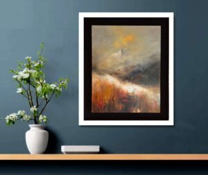 Abstract landscape painting in a black frame with a white mat, hung on a blue wall above a wooden shelf with a white vase of flowering branches. A small white object sits on the shelf nearby. 2026